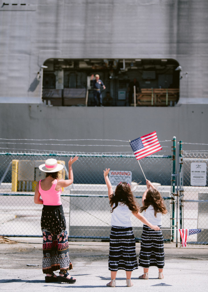 family waves farewell as ship deploys from mayport florida